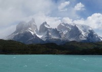The jagged peaks of Torres del Paine towering over forests and lakes