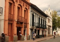A typical street scene in colonial Cuenca, Ecuador.