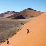 Woman walking on Dune 45 | Namibia 