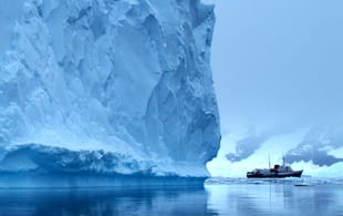 The Ushuaia with giant iceberg