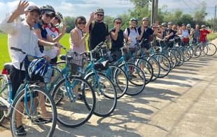 Tran Tuan in Vietnam - group on bikes - On The Go Tours
