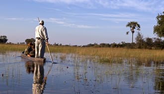 Canoe safari in a traditional mokoro - Okavango Delta - Botswana