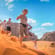 Group running down dune in Wadi Rum - Jordan Tours - On The Go Tours
