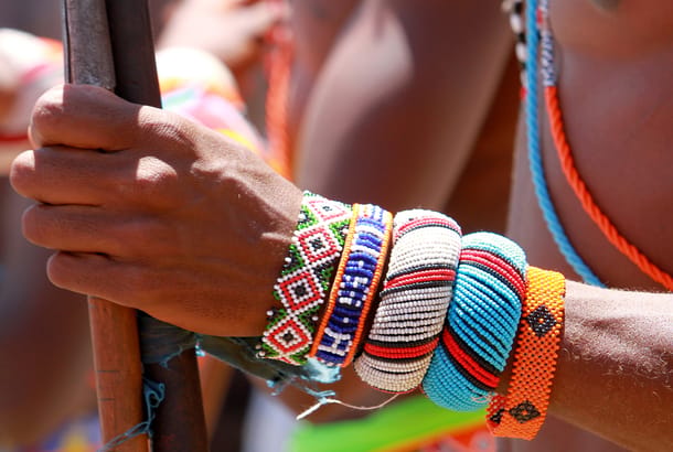 A Samburu warrior standing in the heat at the lake Turkana festival in Kenya