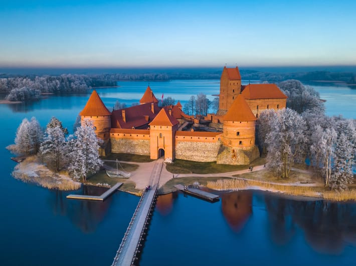 Trakai castle at winter, aerial view of the castle with frozen trees