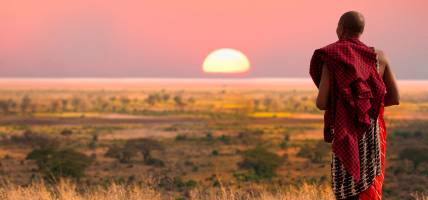 00000-Masai-Warrior-watching-sunset