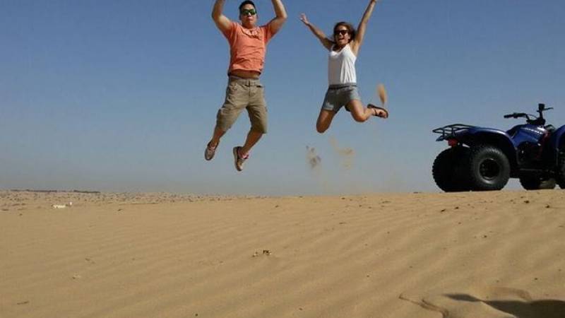 Dubai Desert Morning Tour in 4WD Vehicle: Camel Ride, Quad Bike Tour, Sandboarding, and Camel Farm