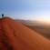 A man on Dune 45 Sossusvlei Namibia