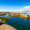 An aerial view of Puno city on the banks of Lake Titicaca in Peru