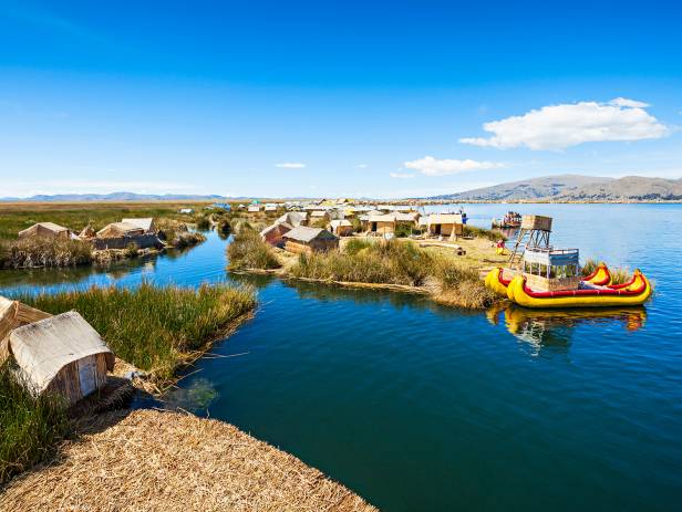 An aerial view of Puno city on the banks of Lake Titicaca in Peru