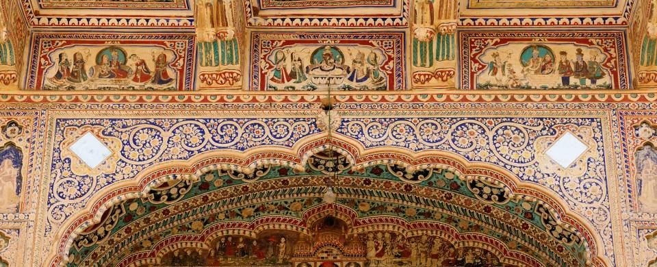 Intricate fresco on the inside walls of a haveli in Alsisar