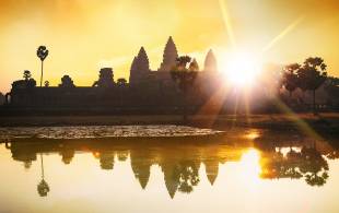 Angkor Wat in Cambodia at sunrise - Southeast Asia - On The Go Tours