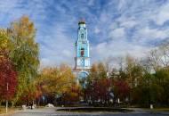 The towering spire of the Ascension Church surrounded by attractive parkland in Yekaterinburg