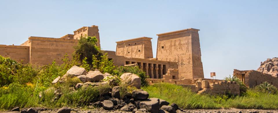Ancient ruins standing majestically against the sky in Aswan