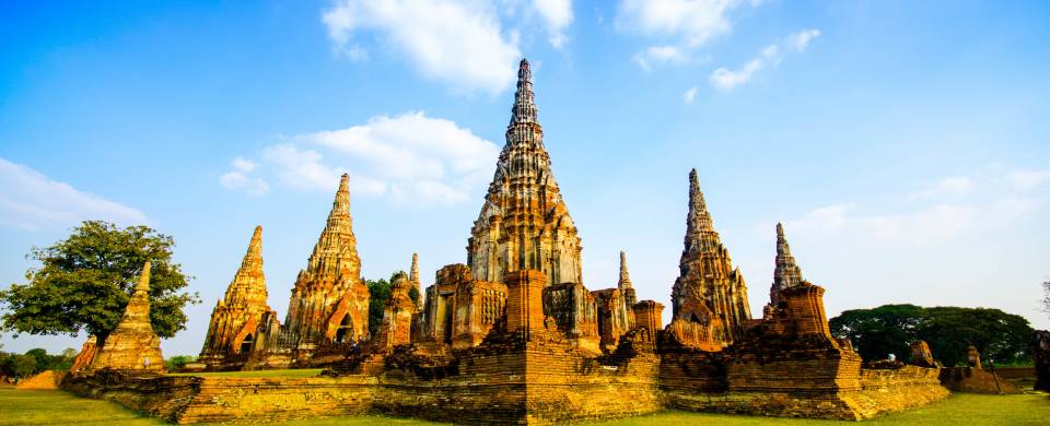 Ancient temples against a bright blue sky in Ayutthaya