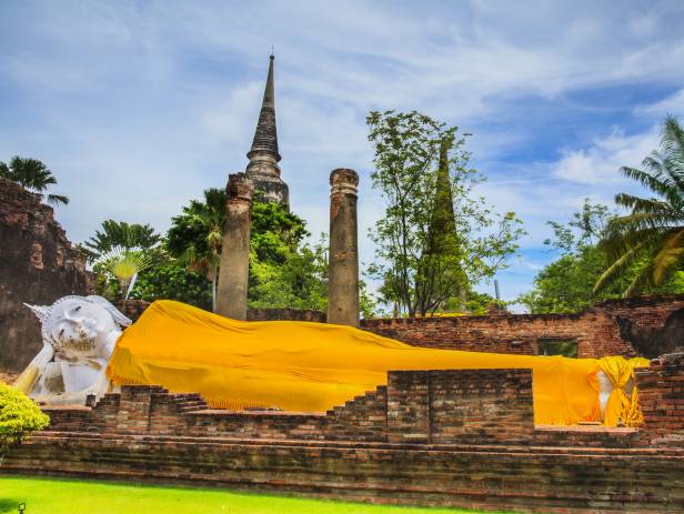 Ancient temples against a bright blue sky in Ayutthaya