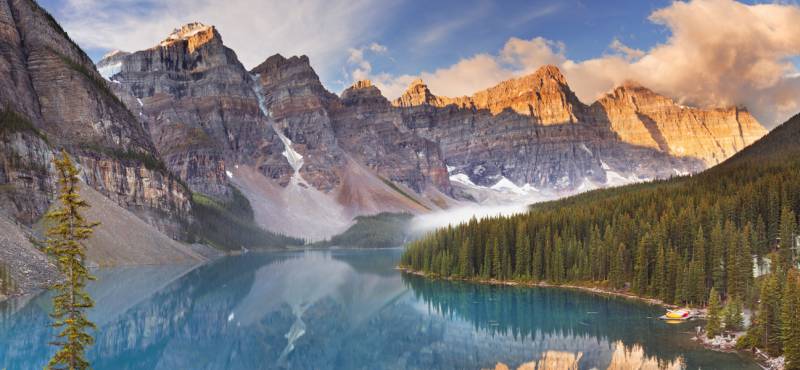 A dazzling blue lake backed by snow-capped mountains in the Banff National Park