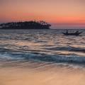 Traditional Sri Lankan boat on the sandy beach in Bentota and Beruwala