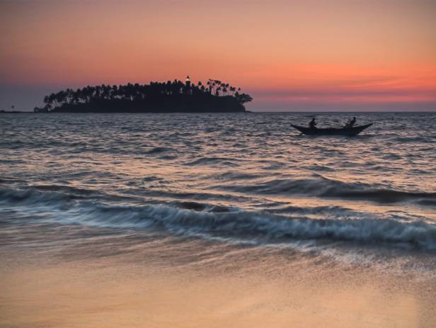 Traditional Sri Lankan boat on the sandy beach in Bentota and Beruwala