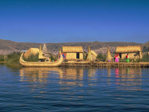 An aerial view of Puno city on the banks of Lake Titicaca in Peru