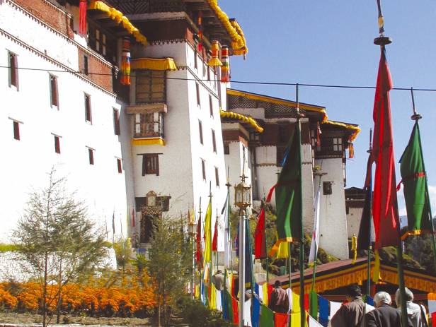 The Tiger Nest temple sitting precariously on the side of a cliff in Paro