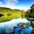 Colourful boats on the edge of the lake in Pokhara