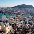 Aerial view of the cityscape in Busan, lit up at night