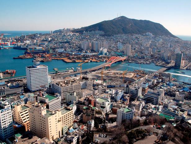 Aerial view of the cityscape in Busan, lit up at night