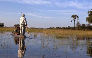 Canoe safari in a traditional mokoro - Okavango Delta - Botswana