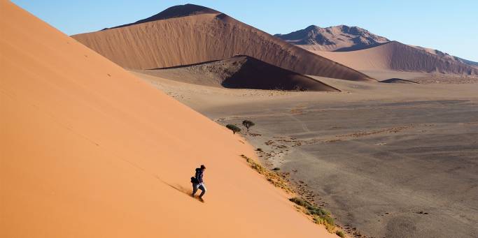 Woman walking on Dune 45 | Namibia 