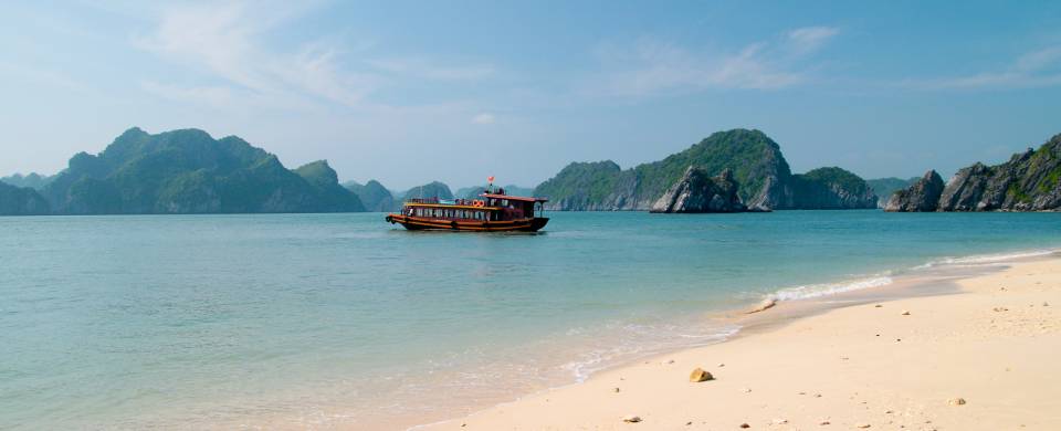 The stunning beach of Cat Ba Island with other islands in the background