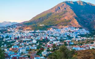 Chefchaouen Cityscape Rif Mountains backdrop