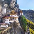 The Tiger Nest temple sitting precariously on the side of a cliff in Paro