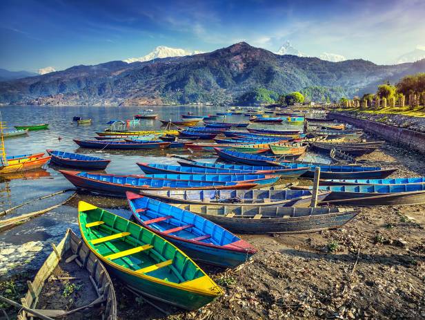 Colourful boats on the edge of the lake in Pokhara