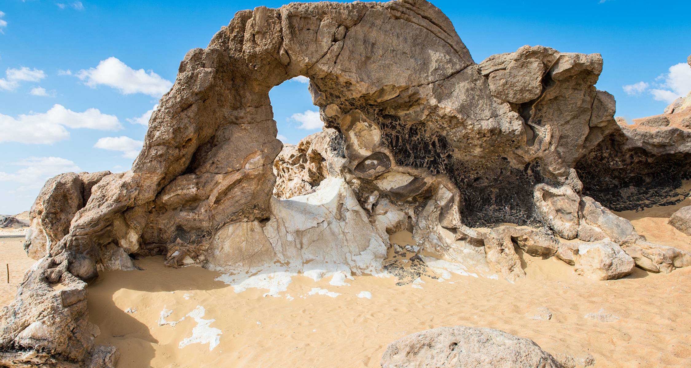 Crystal Mountain ridge and natural arch in Egypt’s Western Desert