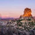 Hot air balloons floating over the stunning landscape of Cappadocia