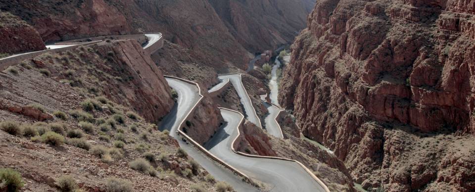 Long road winding up the side of the mountain at Dades Gorge