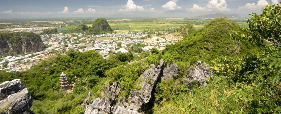 Rolling mountains covered in lush grass near the centre of Danang