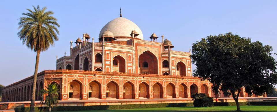 Humayun's tomb glowing in the waning sunlight in Delhi