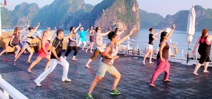 Doing Tai Chi on deck in Halong Bay - Vietnam Tours - Southeast Asia Tours - On The Go Tours