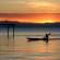 A fisherman in traditional canoe at Lake Malawi | Malawi