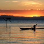 A fisherman in traditional canoe at Lake Malawi | Malawi