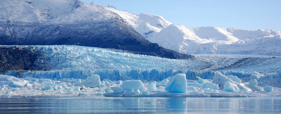 Impressive Perito Moreno glacier surrounded by snowy mountains in El Calafate