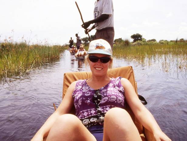 Mokoro boat gliding along the Okavango River