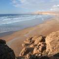 The walled city of Essaouira sitting on the edge of the water