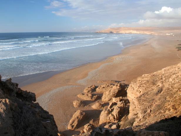 The walled city of Essaouira sitting on the edge of the water