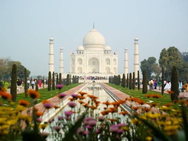 The Taj Mahal reflected in the water in Agra
