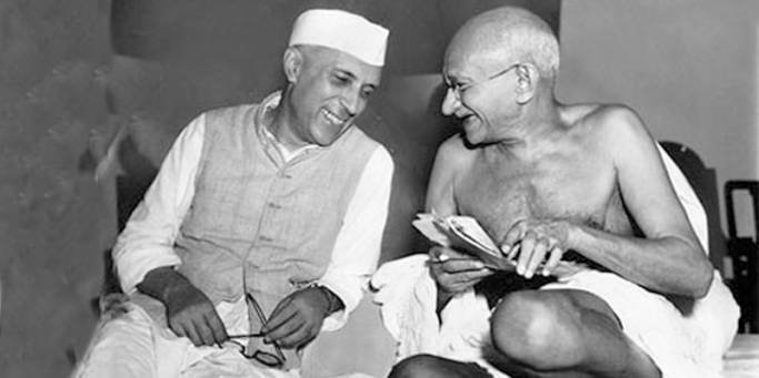 A photo of Gandhi chatting with Nehru