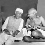 A photo of Gandhi chatting with Nehru