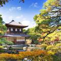 Beautiful lake with a temple in the background in springtime in Kyoto